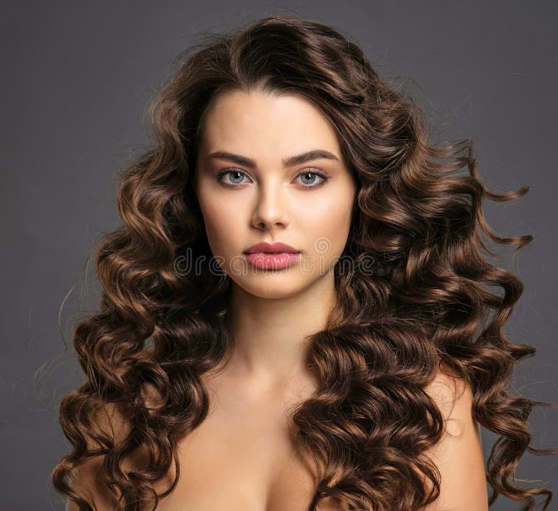 Beautiful Young Woman with Long Curly Brown Hair Stock Image - Image of