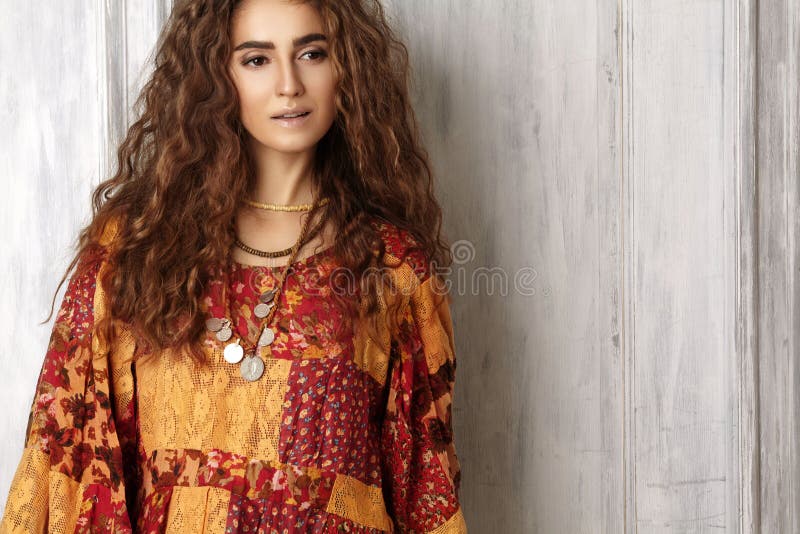 Beautiful Young Woman with Long Curly Hairstyle, Fashion Jewelry with Brunette Hair. Indian Style Clothes, Long Dress Stock Photo - Image of indian, clothes: 128172870 Beautiful Young Woman with Long Curly Hairstyle, Fashion Jewelry with Brunette Hair. Indian Style Clothes, Long Dress Stock Photo - Image of indian, clothes: 128172870