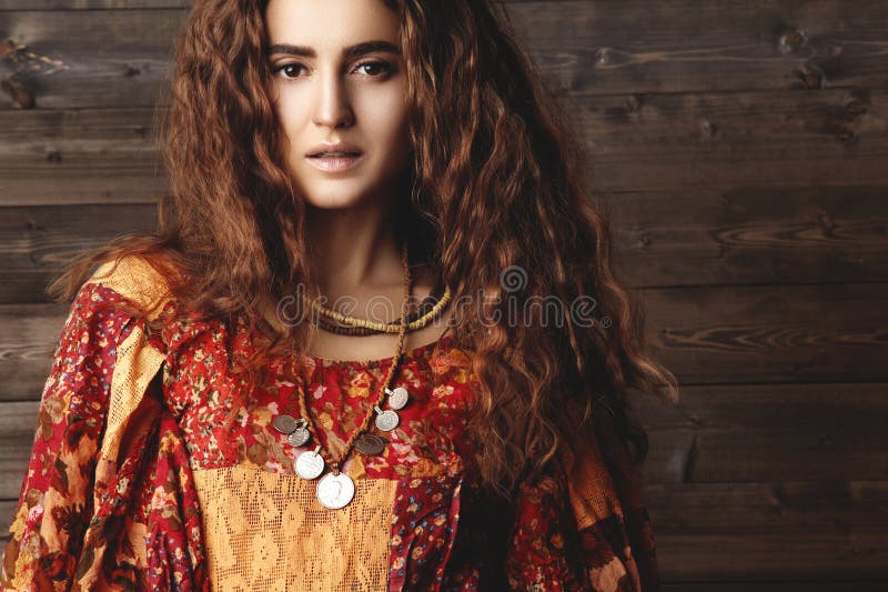 Beautiful Young Woman with Long Curly Hairstyle, Fashion Jewelry with Brunette Hair. Indian Style Clothes, Long Dress Stock Photo - Image of beauty, beautiful: 113002854 Beautiful Young Woman with Long Curly Hairstyle, Fashion Jewelry with Brunette Hair. Indian Style Clothes, Long Dress Stock Photo - Image of beauty, beautiful: 113002854