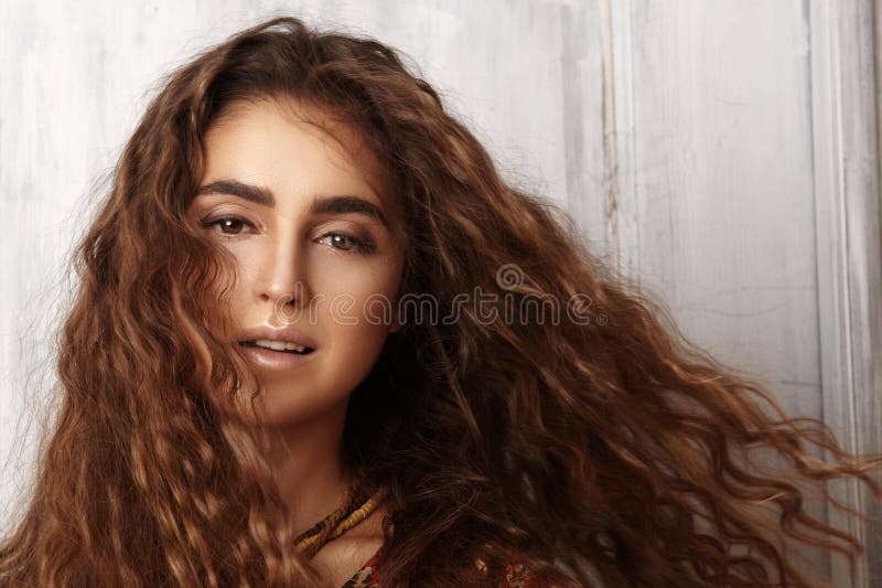 Beautiful Young Woman with Long Curly Hairstyle, Fashion Jewelry with Brunette Hair. Indian Style Clothes, Long Dress Stock Photo - Image of graceful, arabian: 128173004 Beautiful Young Woman with Long Curly Hairstyle, Fashion Jewelry with Brunette Hair. Indian Style Clothes, Long Dress Stock Photo - Image of graceful, arabian: 128173004