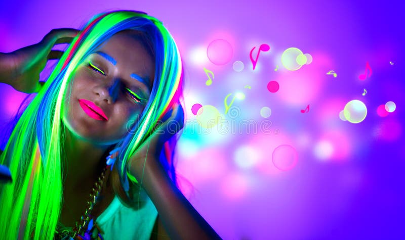 Beautiful young woman in neon light