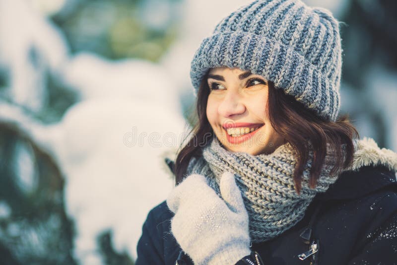 Beautiful Young Woman In Park On Snowing Winter Day. Stock Photo ...
