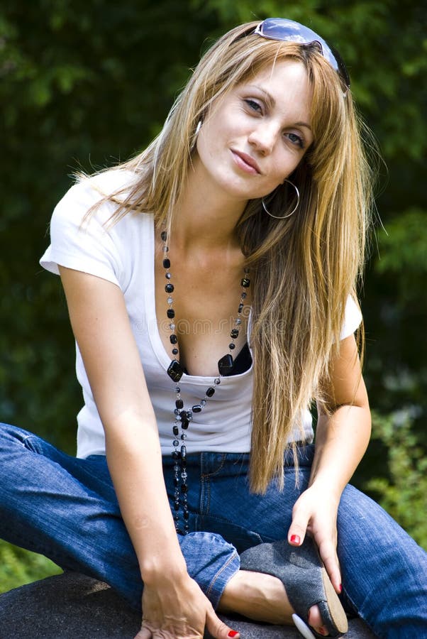 Beautiful young woman posing royalty free stock photography