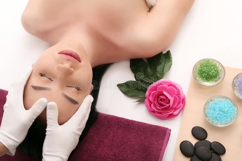 Beautiful young woman receiving facial massage in spa salon royalty free stock image Beautiful young woman receiving facial massage in spa salon royalty free stock image