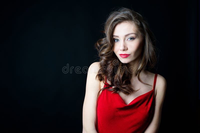 Beautiful Young Woman in Red Dress Holding Gun Stock Photo - Image of ...