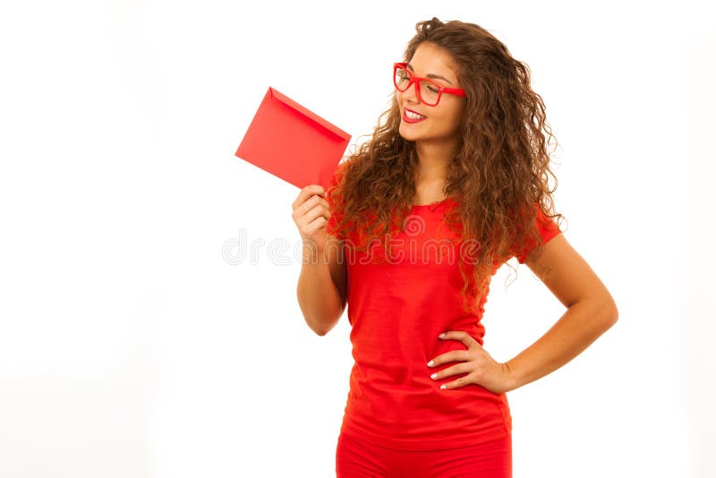Beautiful young woman in red holding red envelope stock image Beautiful young woman in red holding red envelope stock image
