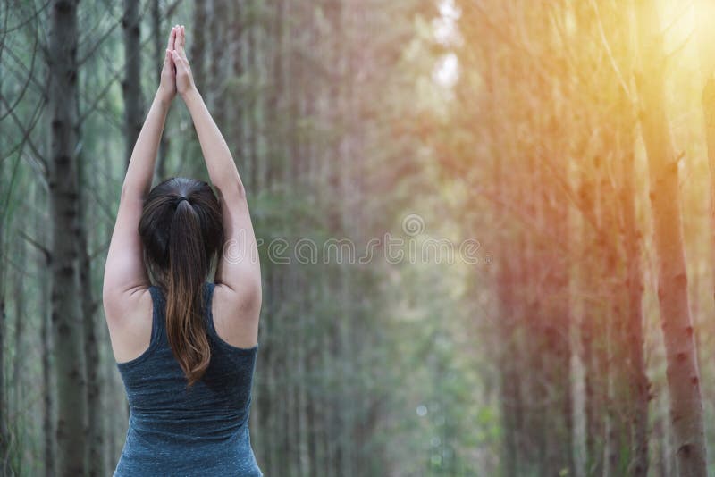 Beautiful young woman relaxation standing fitness exercise yoga