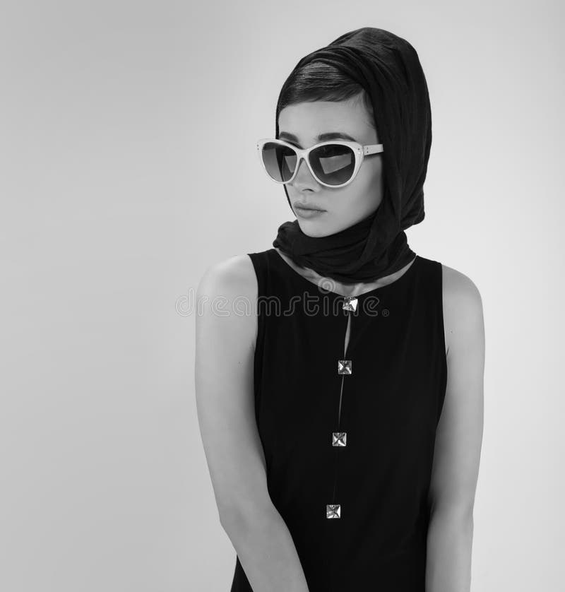 Beautiful Young Woman Looking Like Audrey Hepburn In Hat With Scarf And  Sunglasses Stock Photo, Picture and Royalty Free Image. Image 39110930.