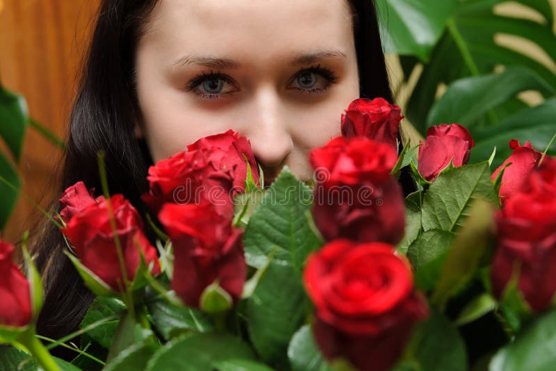 Beautiful young woman with roses and white horse stock image Beautiful young woman with roses and white horse stock image