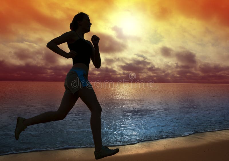 Beautiful young woman running on a beach