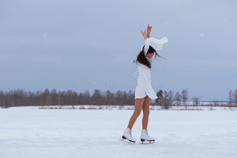 Beautiful young woman on skates