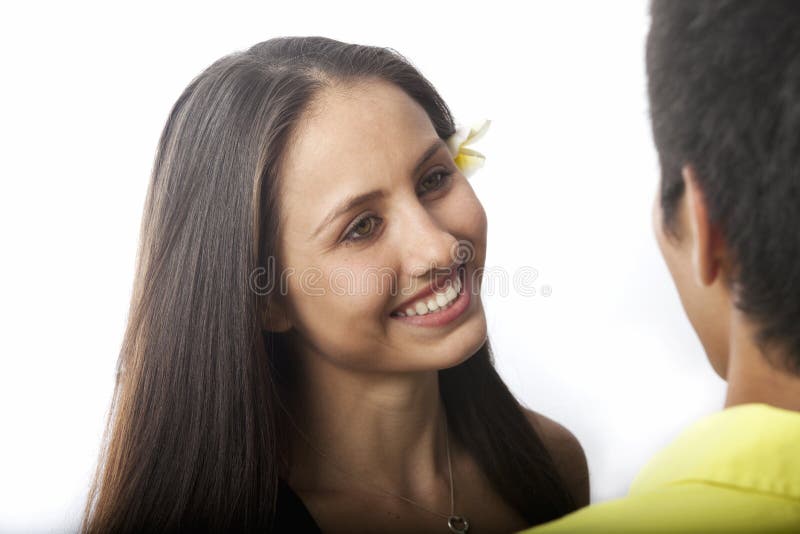 Beautiful young woman talking to a man