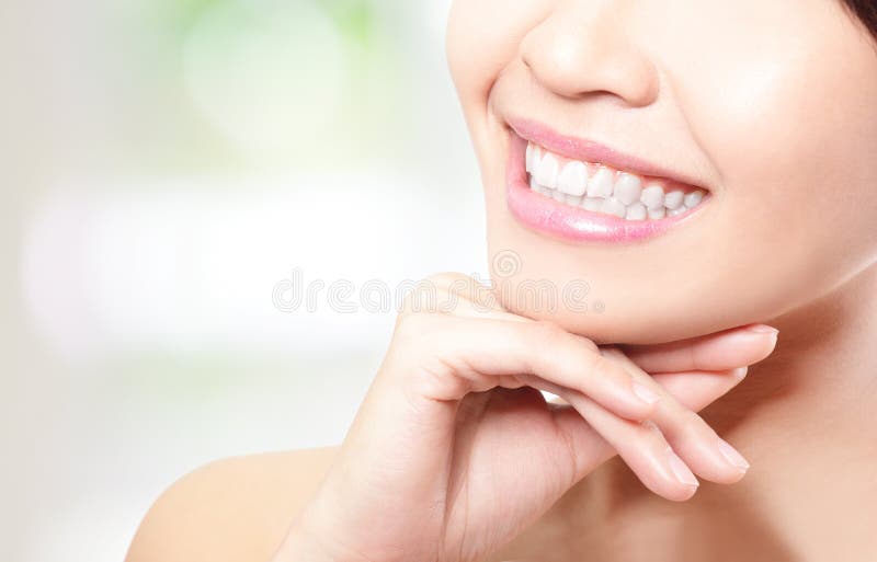 Beautiful young woman teeth close up