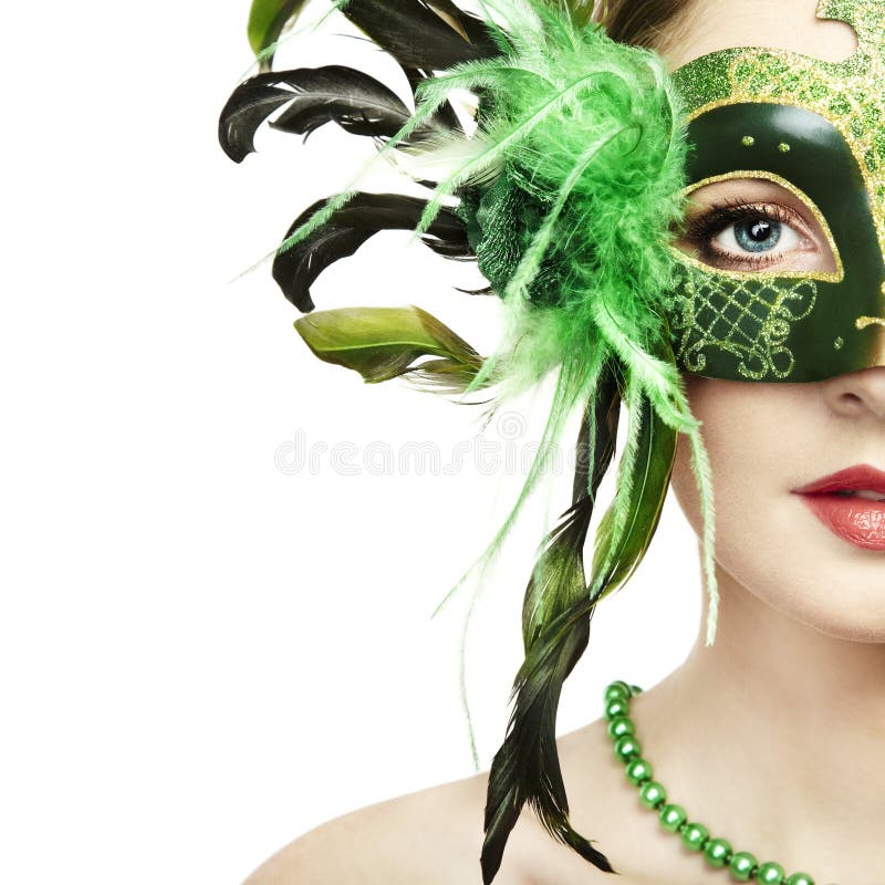 The beautiful young woman in a venetian mask