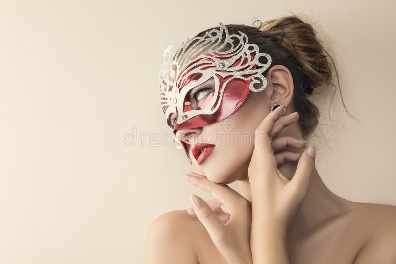 Beautiful young woman in venetian