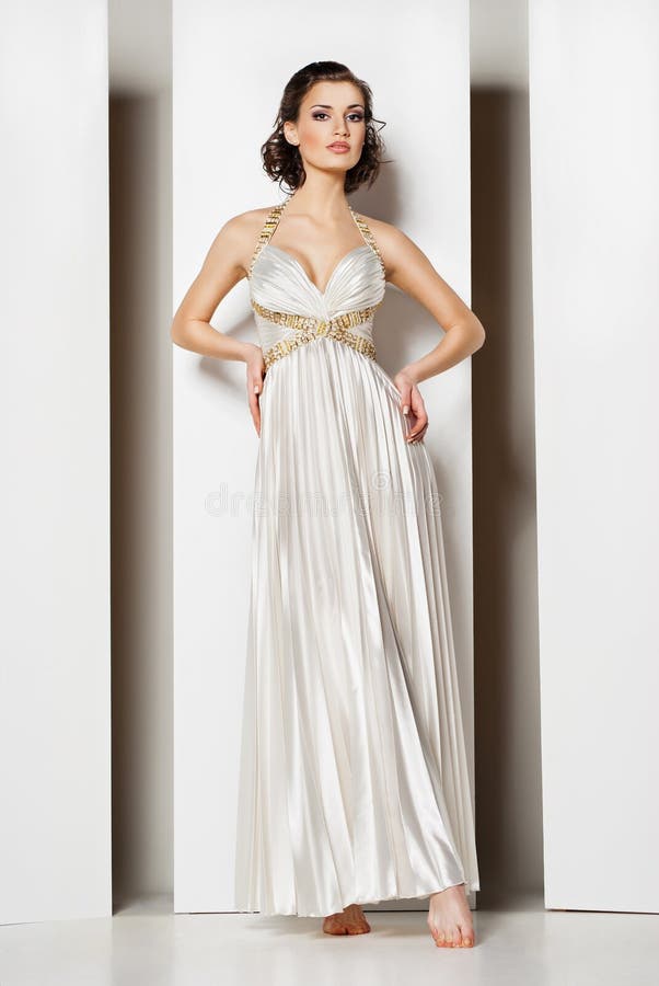 The beautiful young woman in a wedding dress royalty free stock photo The beautiful young woman in a wedding dress royalty free stock photo
