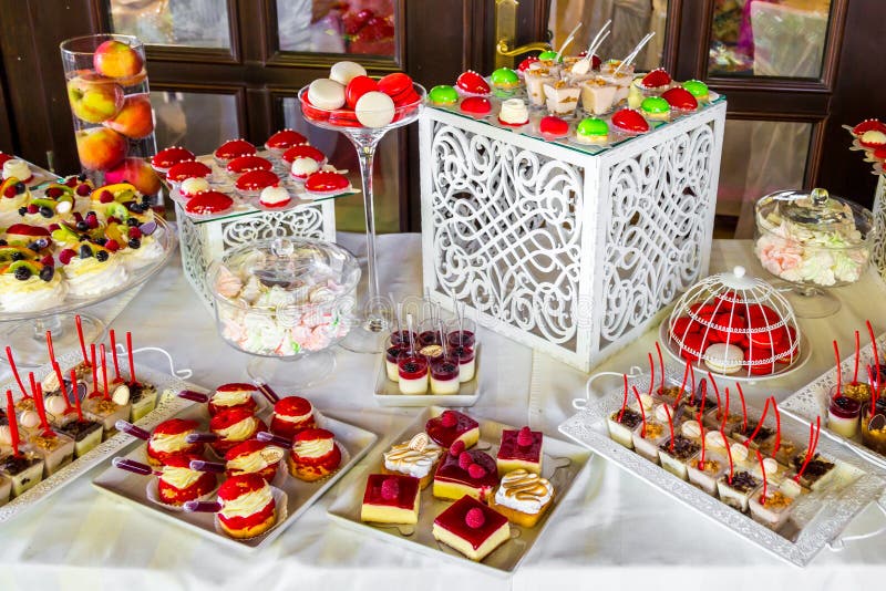 Beautifully Decorated Banquet Catering with Candy Bar Stock Photo