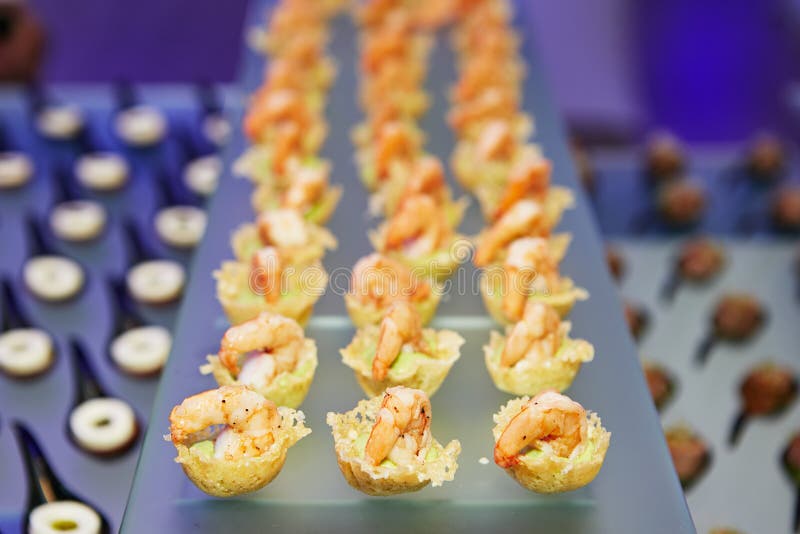 Beautifully decorated catering banquet table with different food royalty free stock photo Beautifully decorated catering banquet table with different food royalty free stock photo