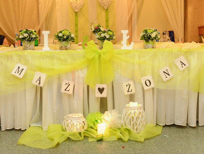 Beautifully Decorated Wedding Table and Other Details at Wedding Hall