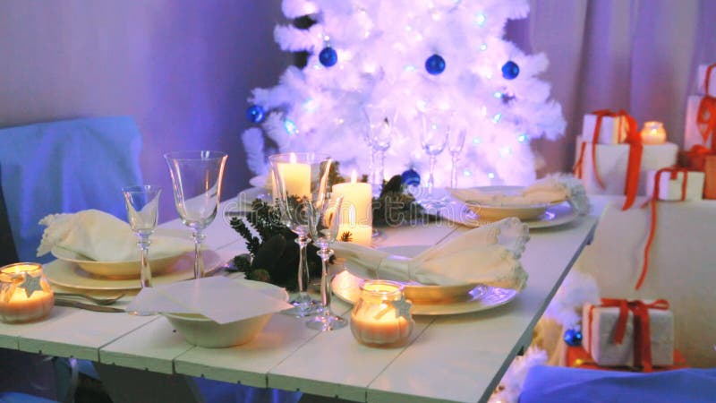 Beautifully Decorated White Christmas Table Stock Footage - Video of shining, gift: 76778840