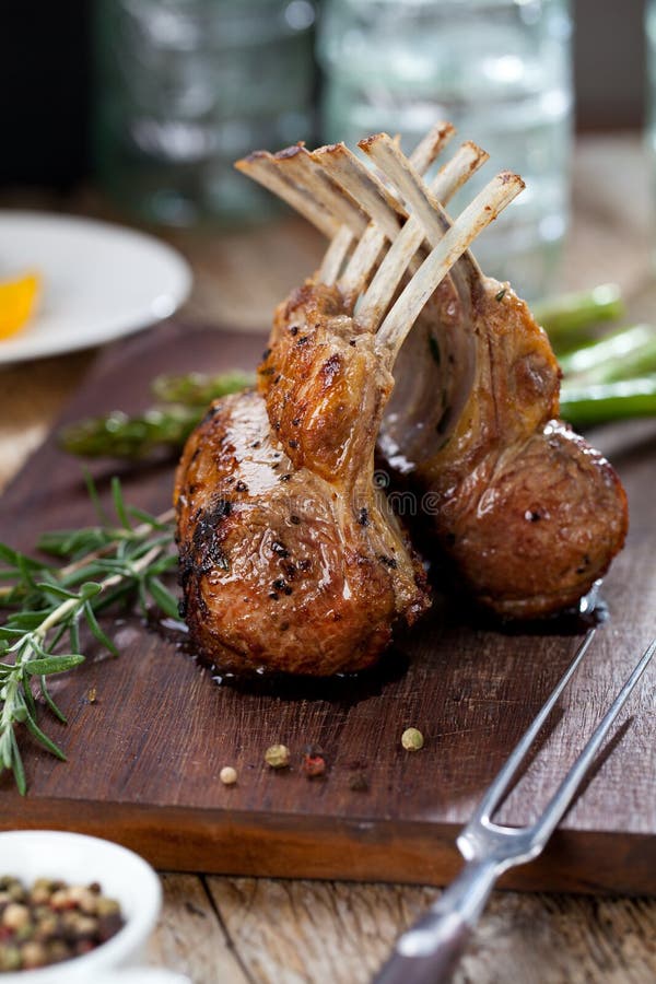 Beautifully Grilled Lamb Rib Chop Steaks, Medium Rare . Stock Image