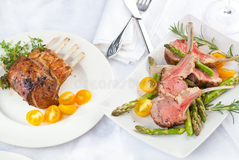 Beautifully Grilled Lamb Rib Chop Steaks, Medium Rare . Stock Photo