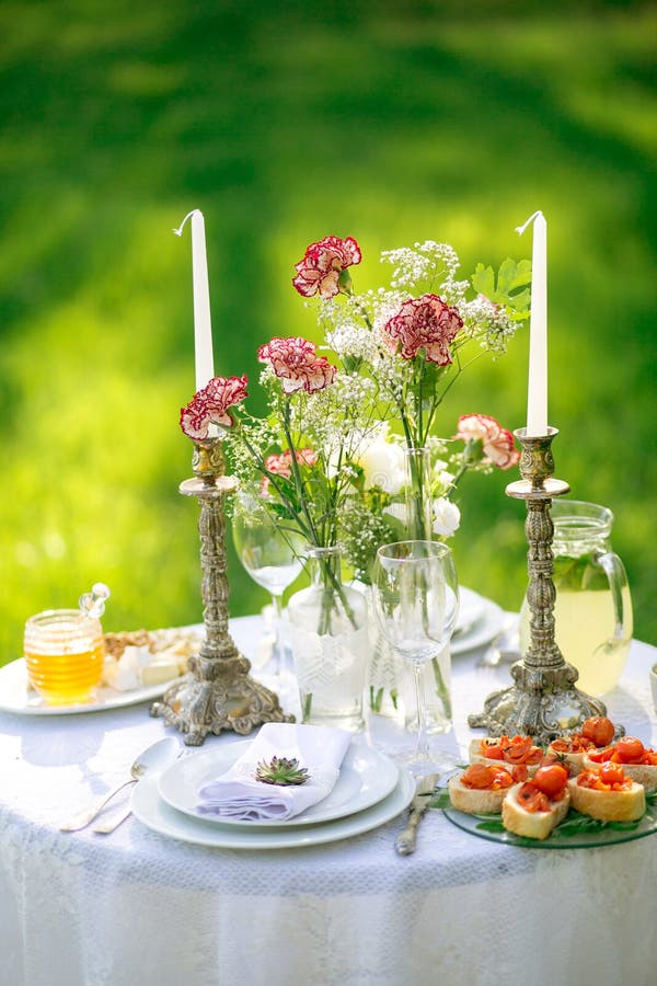 Beautifully Laid a Festive Table for Two in the Garden Stock Image ...