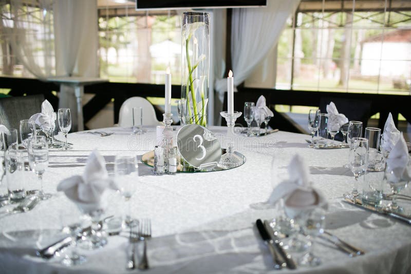 Beautifully organized event - served banquet tables ready for guests