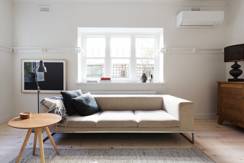 Beautifully styled interior living room of sofa and coffee table stock image Beautifully styled interior living room of sofa and coffee table stock image