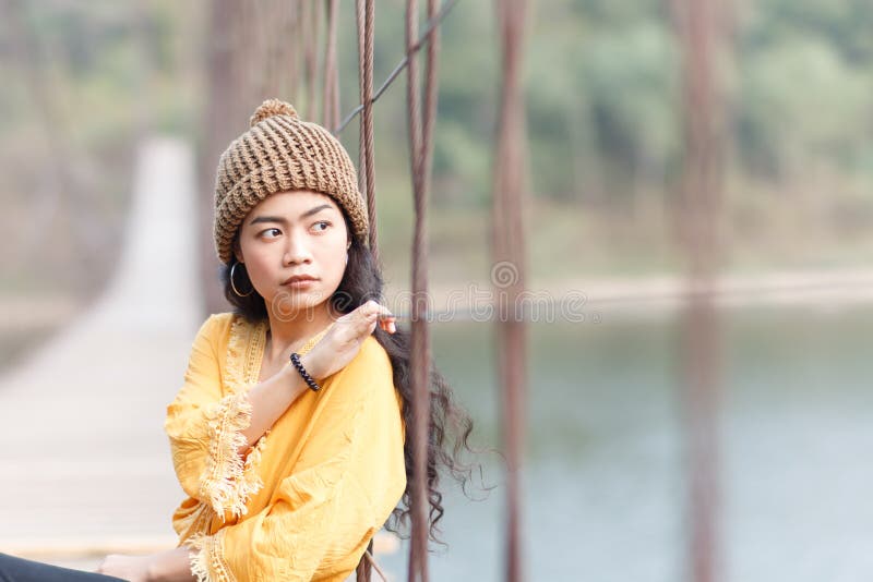 Woman on the wooden bridge stock images Woman on the wooden bridge stock images