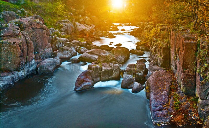 Beauty autumnal day on the mountain river