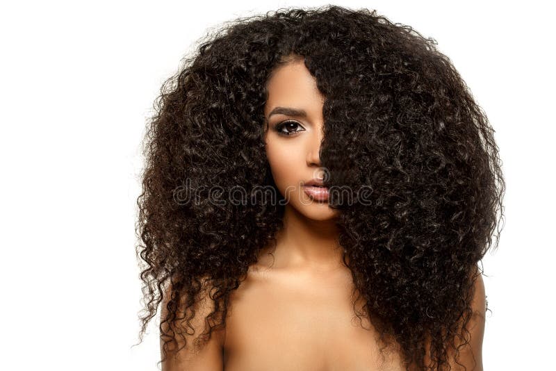 Beauty black skin woman African Ethnic female face. Young african american model with long afro hair. Lux model