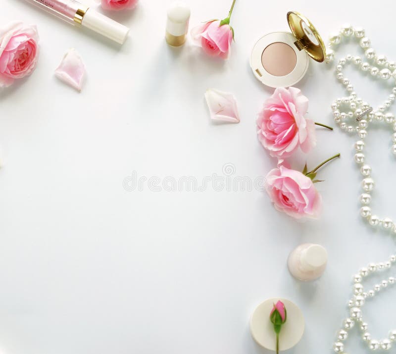 Beauty blog concept. Female make up accessories and roses royalty free stock photos Beauty blog concept. Female make up accessories and roses royalty free stock photos