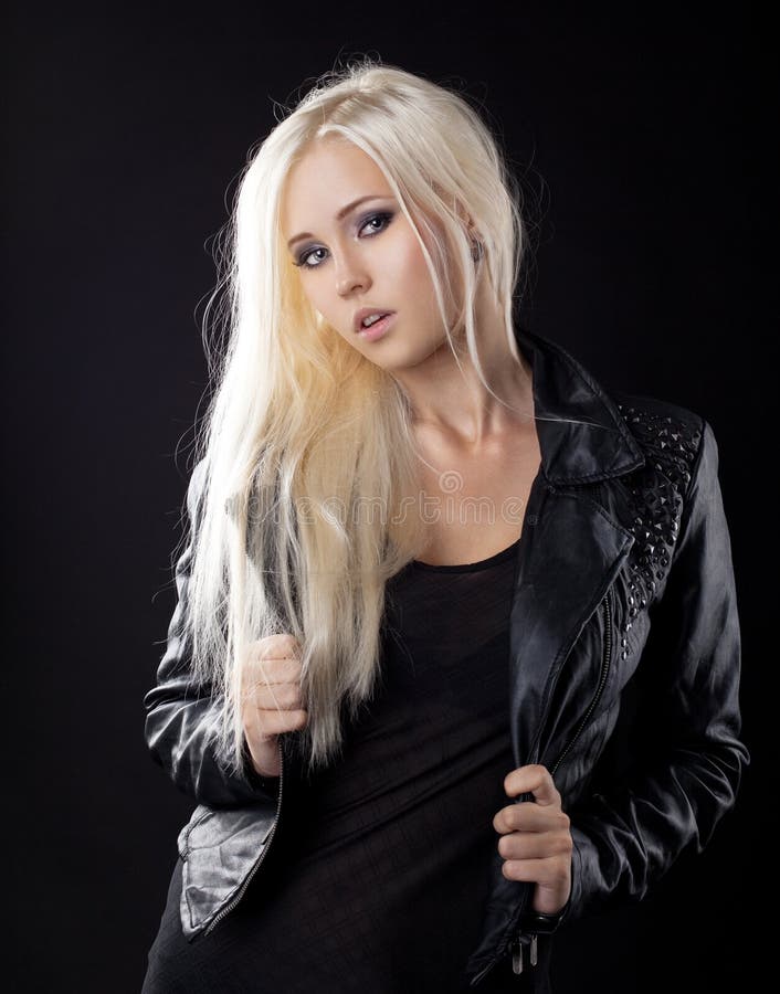 Beauty blond girl in leather jacket