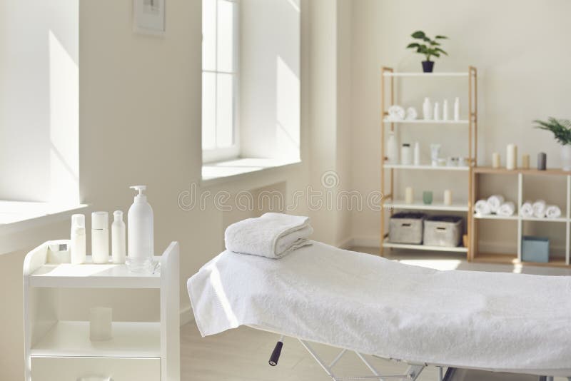 gå rynker Regeneration Massage Room or Beauty Parlor with Empty Bed and Ready Set of Organic Skincare  Products Stock Photo - Image of interior, professional: 198739692