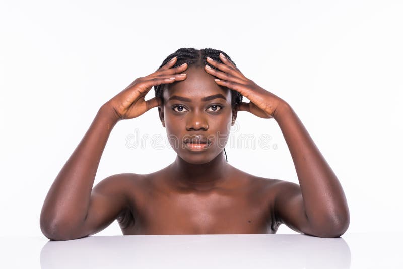 Beauty closeup portrait of beautiful african american woman looking at camera standing isolated on gray background stock image Beauty closeup portrait of beautiful african american woman looking at camera standing isolated on gray background stock image