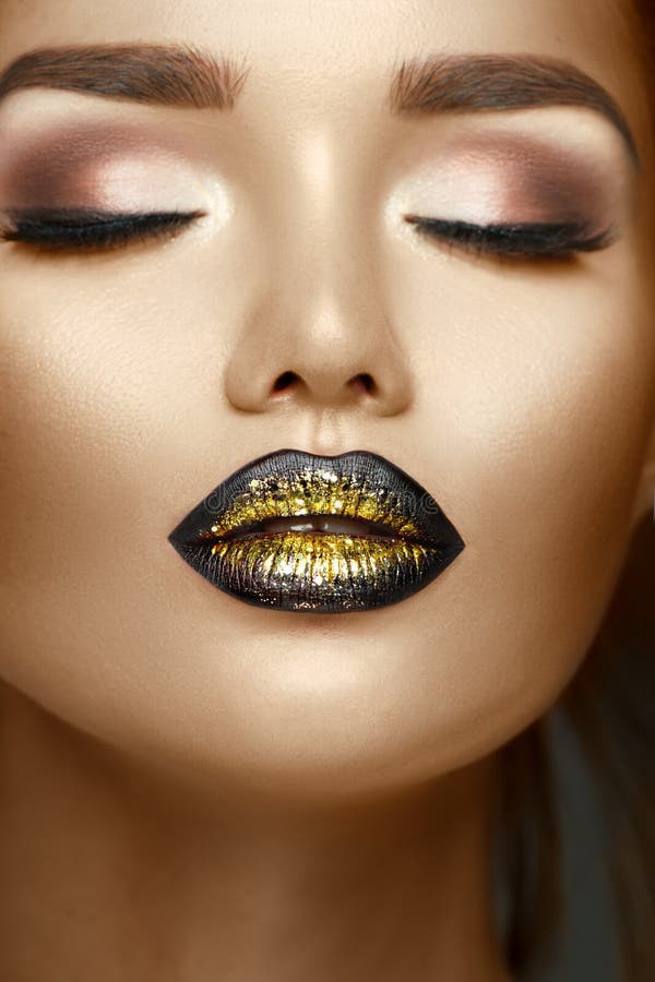 Beauty fashion model girl with black and gold gradient lips, Trendy makeup, perfect skin