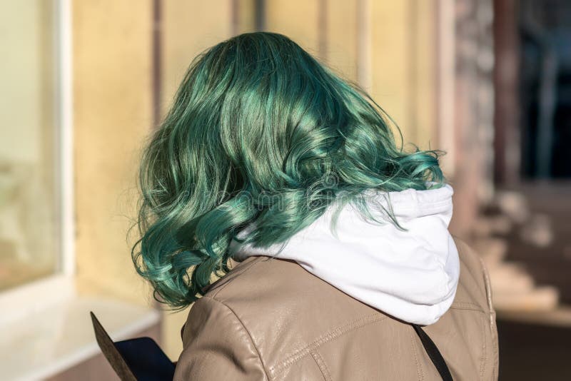 Girl with Turquoise Dyed Hair. Woman with Turquoise Color Curly Hair in  Beige Leather Jacket on the Autumn Street Stock Image - Image of curly,  expression: 230245089