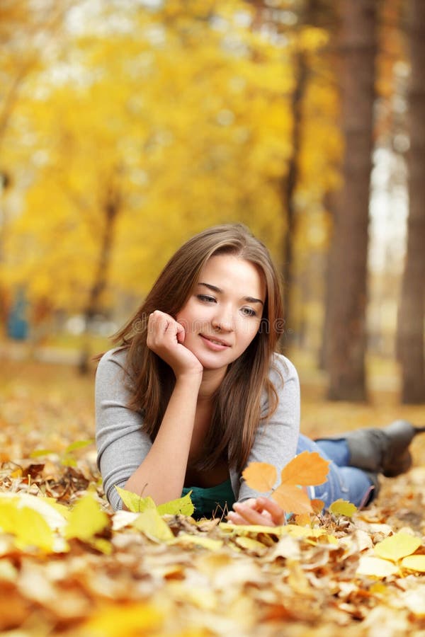 Beauty girl in autumn park