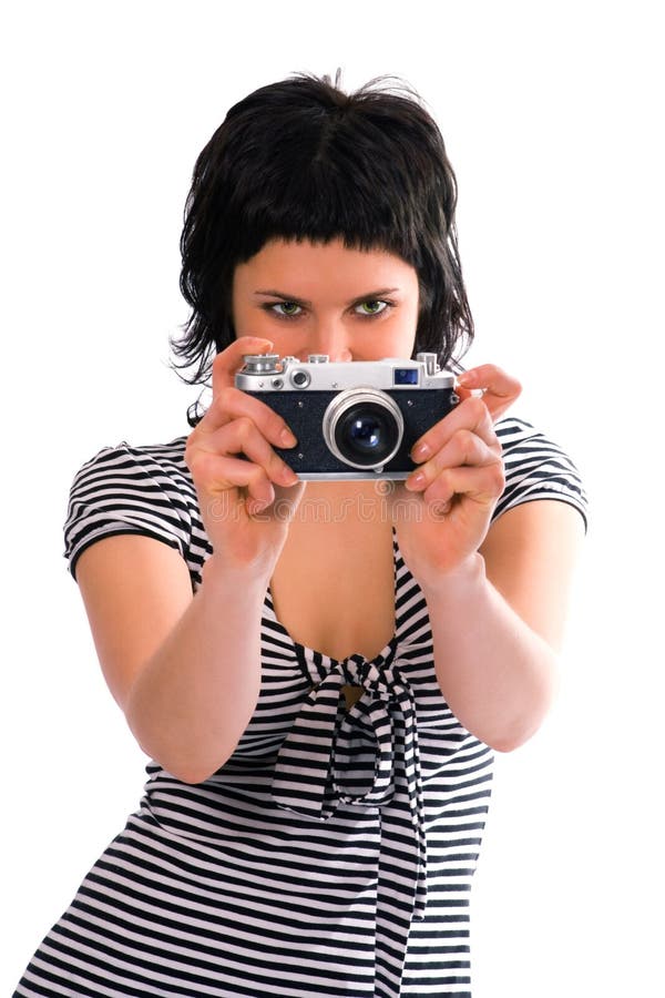 Beauty girl photographer in sailor s vest with photo camera