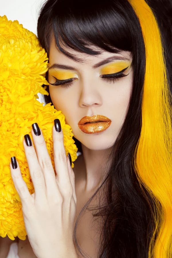 Beauty Girl Portrait with Colorful Makeup, Long Hair, Nail polish. Manicure and Hairstyle. Black and yellow Colors