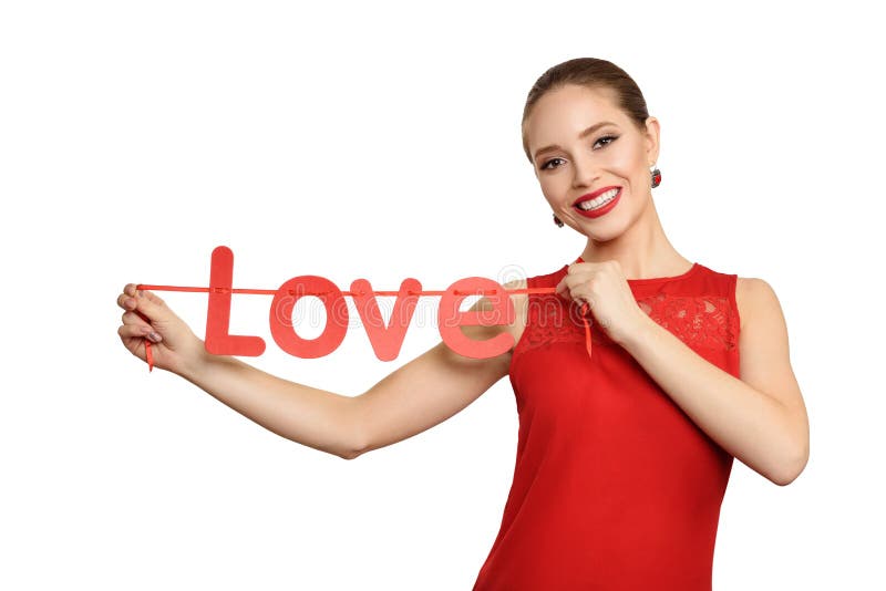 Beauty girl with a red text in shape love, isolated on a white background stock photo Beauty girl with a red text in shape love, isolated on a white background stock photo
