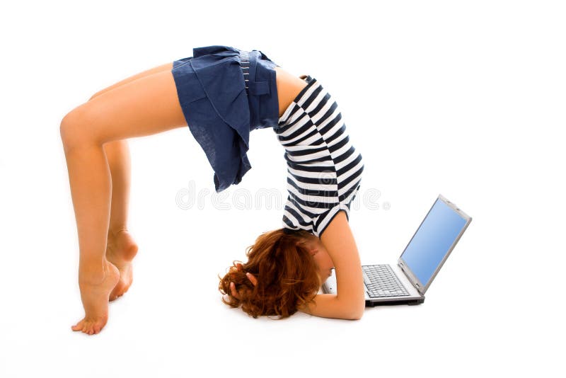 Beauty girl stand on head with laptop