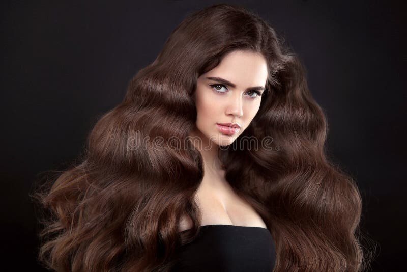 Beauty Hair  Brunette Girl  With Long  Shiny Wavy Hair  