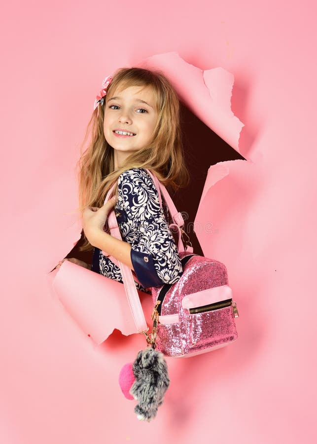 Beauty, kid fashion, cosmetics, healthy hair. Stylish girl with pretty face on grey background. Hairdresser, skincare stock photo Beauty, kid fashion, cosmetics, healthy hair. Stylish girl with pretty face on grey background. Hairdresser, skincare stock photo