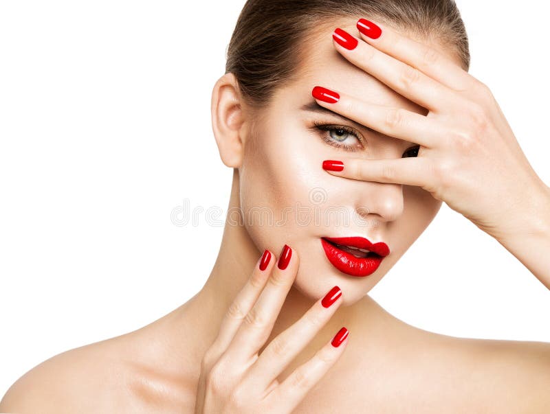 Beauty Model Make up and Red Nail Polish. Woman Face Skin Care Cosmetics. Fashion Girl Portrait with Red Lips and Hands Manicure