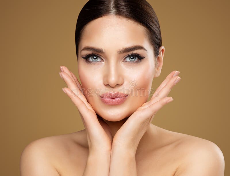 Beauty Model showing Cheekbones and Full Lips. Beautiful Woman Face Skin Care. Women Dermal Filler and Permanent Make up. Cosmetology. Lip Augmentation Facial