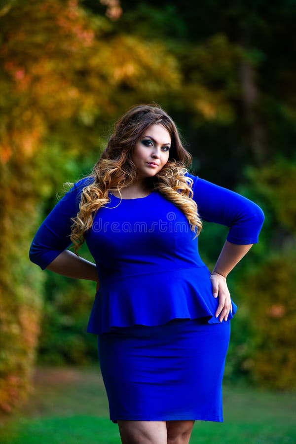 Beauty Plus Size Model With Professional Hairstyle And Makeup Outdoors Fat Woman In Autumn Park