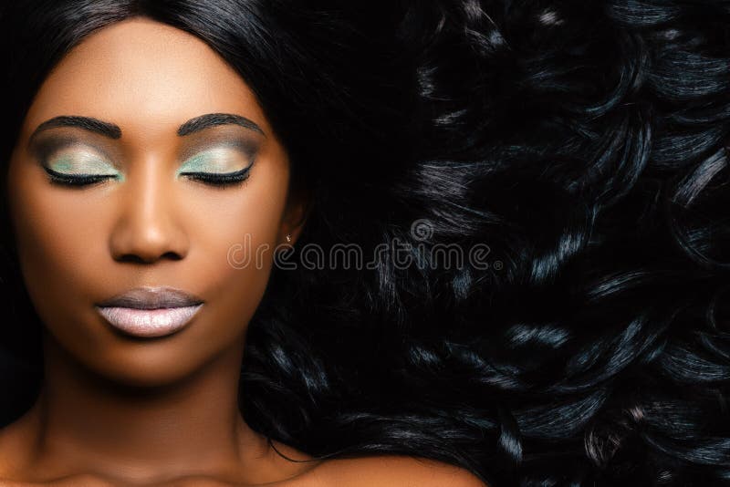 Beauty Portrait of African Woman Showing Long Hair with Smooth ...
