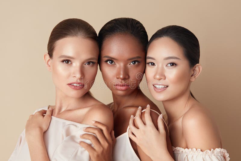Beauty. Portrait Of Diversity Models. Mixed Race, Asian And Caucasian Girls Hugs Each Other And Looking At Camera.